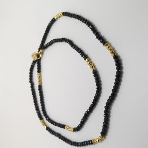 24" Mary Kathryn black spinal rondelle and gold pyrite single strand necklace